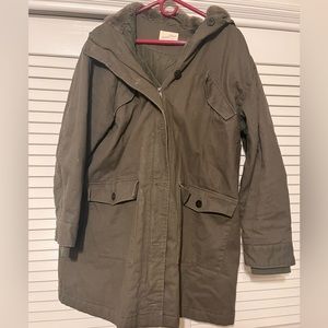 Universal thread army green coat with faux fur hood. Light wear